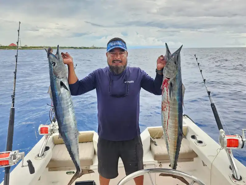 Happy clients with filleted catch