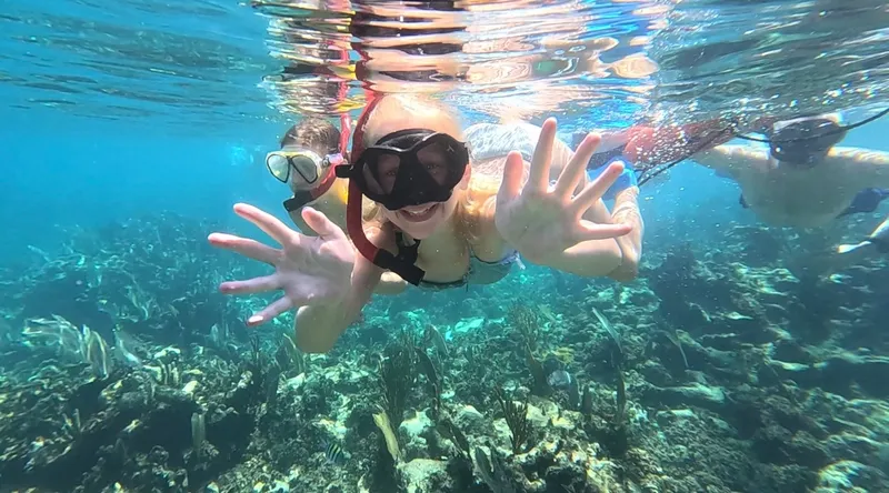 Guests enjoying a fishing and snorkeling combo tour